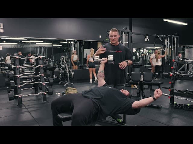 Single Arm Dumbbell Pressing